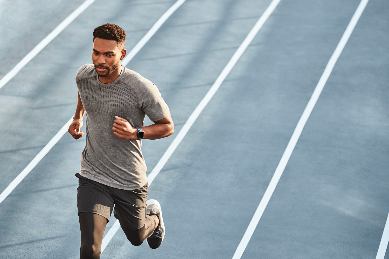 Lifestyle photo of Fitbit Versa 2.,,Photographer Matt Hawthorne